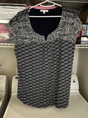 Sleeveless navy top with embroidery
